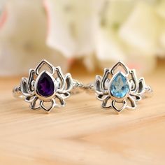 Natural Blue Topaz Lotus Ring-Handmade Lotus Amethyst Silver Ring-Sterling Silver Ring-Silver Lotus Ring-Gift for her- December Birthstone Stone Material:-  Amethyst, Blue Topaz Weight (Approx.):- 3.90 Gram Length:- 15mm Width:- 3 mm  Height:- 5 mM Stone Size (Approx.):- 7 x 5 mm Pear Total Number of Stones:  1 Stone Setting: Bezel Setting Metal: 925 Sterling Silver Finish: High Polish GN-R-1089 Silver Birthstone Ring With Gemstone Accents As Gift, Sterling Silver Rings With Gemstone Accents For Gift, Gift Amethyst Ring With Gemstone Accents, Silver Birthstone Ring With Natural Stones For Gift, Blue Topaz Stackable Rings As A Gift, Spiritual Amethyst Ring With Natural Stones As Gift, Spiritual Silver Birthstone Ring With Accent Stones, Silver Spiritual Birthstone Ring With Accent Stones, Spiritual Sterling Silver Birthstone Ring With Accent Stones