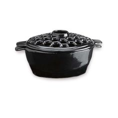 a black casserole on a white background