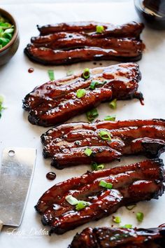 bbq ribs with sauce and green onions on the side