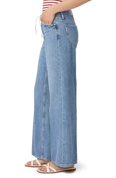 Weekend-ready wide-leg jeans get casual-chic style from a tie at the high waist and medium-wash PAIGE Vintage denim with a soft, broken-in feel. 31" inseam; 24" leg opening; 11" front rise; 15" back rise (size 29) Zip fly with button and drawstring closure Five-pocket style 60% cotton, 40% lyocell Machine wash, tumble dry Imported Urban Wide Leg Rigid Denim Pants, Wide Leg Medium Wash Rigid Denim Pants, Everyday Wide-leg Rigid Denim Pants, Pre-washed Wide Leg Denim Bottoms, Non-stretch Wide Leg Washed Blue Jeans, Platform Slippers, Casual Chic Style, Designer Clothes For Men, Modern Outfits