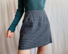 This vintage wool blend mini pencil skirt in gray plaid features a high-waisted, tailored fit.  With a back zip closure and full lining, it's a versatile piece that blends 90s grunge with a preppy, minimalist vibe or would also perfectly fit into a dark academia wardrobe.  Fits like a size S, shown on a model who is 5'6" (170 cm) and typically wears XS/S. ✏️TAGS LABEL OF GRADED GOODS Size 38 25% wool 25% polyester 45% acrylic 5% other fibers ✂️ CONDITION  Good vintage condition, WASHED & STEAMED Dark Academia Wardrobe, Mini Pencil Skirt, Gray Plaid, Vintage Plaid, Wool Plaid, Vintage Wool, Festival Season, Wool Blend, Pencil Skirt