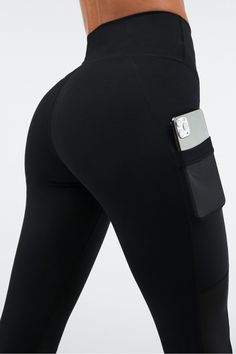 On-The-Go PowerHold® High-Waisted Capri Fabletics black female Activewear >> Womens >> Bottoms >> Leggings >> Capris PowerHold regular Training 4-Way Stretch/Breathable/Chafe-Resistant/Moisture-Wicking/Pockets/UPF Protection Flattering, max compression with storage SHOP ALL On-The-Go Compressive Workout Bottoms With Hip Pockets, Black Athleisure Leggings With Pockets, Black Compression Leggings With Pockets, Workout Leggings With Hip Pockets, Stretch Black Yoga Pants With Hip Pockets, Black Stretch Yoga Pants With Hip Pockets, Black Gym Bottoms With Hip Pockets, Black Athleisure Tights With Pockets, Black Sports Tights With Pockets