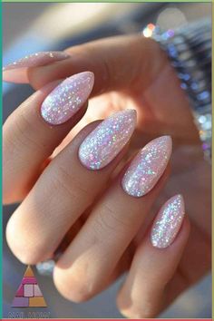 These sparkling nails combine midnight blue hues with shimmering stars and glitter for a truly magical effect. Perfect for witchy nails that stand out at any event. Let your nails be your most enchanting accessory. Find more bewitching ideas at nailhow.com and save this pin! 🔮 Pink Nails Glitter Design, Fall Nail Ideas With Glitter, Pink Glitter Nails Ideas, Nails Acrylic French Tip Sparkle, Pink With Sparkle Nails, Glittery Nails Almond, Gelnagels Ideas, Summer Nails Glitter Sparkle, Summer Work Nails