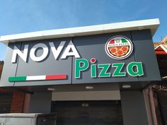 there is a sign for a pizza restaurant on the side of the building that says nova