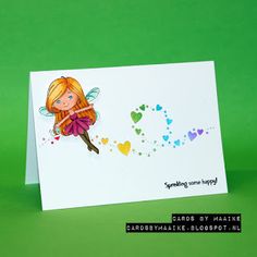 a card with a cartoon fairy on it