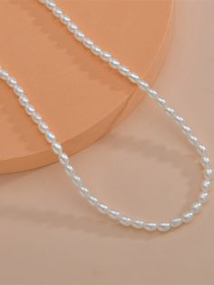 Color: White Gender: Women Material: Plastic Quantity: 1 piece Style: Glamorous Details: Pearls IN Length 15.7-18.5 This data was obtained from manually measuring the product, it may be off by 1-2 CM. Cheap White Beaded Necklaces For Spring, Cheap White Beaded Necklaces, Cheap Trendy White Beaded Necklaces, Casual Cheap Beaded Necklaces With Heart Beads, Cheap White Chain Necklaces, Cheap White Necklaces With Silver Beads, Trendy Cheap White Beaded Necklaces, Cheap White Layered Necklaces, Cheap White Necklace With Heart Beads