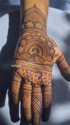 the hand is decorated with intricate designs