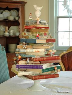 a stack of books sitting on top of a table