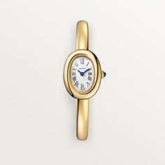 Cartier - Baignoire watch - Watch  - Baignoire de Cartier watch, mini model, size 15, quartz movement. 18K yellow gold (750/1000) case. 18K yellow gold (750/1000) beaded crown set with a sapphire cabochon. 18K yellow gold (750/1000) rigid bracelet. Silvered dial, blued-steel sword-shaped hands, sapphire crystal. Length: 24.6 mm, width: 18.7 mm, thickness: 7.2 mm. Water-resistant up to 3 bar (approx. 30 meters). Cartier Yellow Gold Watch With Diamond Hour Markers, Luxury Gold Oval Watch, Luxury Oval Gold Watches, Cartier Gold Watch With Rectangular Dial, Gold Cartier Watch With Rectangular Dial, Luxury Gold Cartier Watch, Yellow Gold Watch With Round Dial For Evening, Gold Oval Watch With Diamond Hour Markers, Gold Oval Watches With Diamond Hour Markers