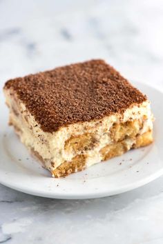 a piece of cake sitting on top of a white plate