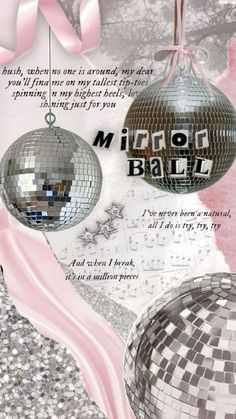 two disco balls hanging from a string with a pink ribbon around it and the words mirror ball