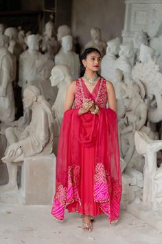 Hot Pink Anarkali Suit Deep V Neck Sleeveless Hand Embroidery Anarkali Dupatta Dress Indian Wedding Ethnic Wear Readymade Anarkali Dress Item Contain - Anarkali Suit with Dupatta  Material : Chinnon Silk, Organza  Color : Hot  Pink Work : Hand Embroidery Work Top Length : 50 Bottom Length :  Size chart attached in images mentions garment measurements in inches. For any sizing queries or getting a customized fit, please message us on Etsy. WASH & CARE Gentle hand wash separately from other garmen Traditional Chikankari Embroidery Lehenga Maxi, Traditional Gown With Chikankari Embroidery, Bollywood Chikankari Embroidered Gown For Diwali, Bollywood Gown With Chikankari Embroidery For Diwali, Traditional Festive Gown With Chikankari Embroidery, Bollywood Chikankari Gown For Diwali, Traditional Sleeveless Cutdana Dress, Sleeveless Cutdana Salwar Kameez For Festivals, Anarkali Sleeveless Salwar Kameez With Chikankari Embroidery