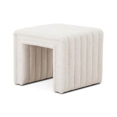 an upholstered stool with three rows of pleated fabric