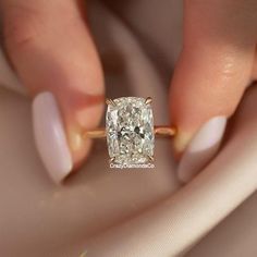 12X8 mm Elongated Cushion Cut Moissanite Diamond Ring, Signature Hidden Halo With Diamond Pave Bridge Engagement Ring, 14k Rose Gold Ring ✹✹𝐖𝐞𝐥𝐜𝐨𝐦𝐞 𝐭𝐨 𝐂𝐫𝐚𝐳𝐲𝐃𝐢𝐚𝐦𝐨𝐧𝐝𝐬𝐂𝐨✹✹ Detail about stones Moissanite  : ----------------------------- Stone Shape: Elongated Cushion Cut Stone Size: 12X8 mm Weight: 5.34 CT Color: Colorless Cut: Excellent Clarity: VVS ★ 𝑰𝒕𝒆𝒎 𝑫𝒆𝒕𝒂𝒊𝒍𝒔:- ☛ Metal Purity: Solid Gold (10KT, 14KT, 18KT); Silver(925 Sterling, 935 Argentium), 950 Platinum ☛ Metal Tone: Yellow, White, Rose ☛ Stamp/Hallmark: Yes ★ 𝑪𝒖𝒔𝒕𝒐𝒎𝒊𝒛𝒂𝒕𝒊𝒐𝒏:- ☛ Customized Design Jewelry. ☛ All cuts which you dream to make with moissanite. ☛ Updating every step of your ordered jewelry(Loose Stone, CAD & Making Process) ☛ All listed items in our stores are made to order. ☛ Split Shank Elongated Cushion, Elongated Cushion Engagement Ring With Side Stones, Emerald Cushion Cut Engagement Ring, Elongated Cushion Cut, Elongated Cushion, Cushion Engagement Ring, Cushion Cut Moissanite, Cushion Cut Engagement Ring, Moissanite Diamond Rings