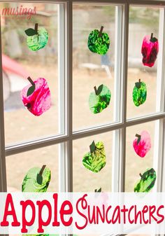 an apple suncather made out of tissue paper on a window sill with the words