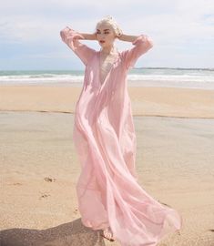 Breezy Pink V-neck Maxi Dress, Summer Beach V-neck Chiffon Dress, Chiffon V-neck Dress For Beach Cover-up, Feminine Boho Maxi Dress For Summer, Pink V-neck Boho Dress For The Beach, Spring Long Sleeve Beach Dress For Beach Party, Long Sleeve Chiffon Beach Dress, Feminine Summer Chiffon Beach Dress, Feminine V-neck Boho Dress For Beach