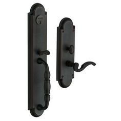 an iron door handle with two handles on each side and one has a black finish