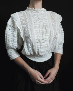 Rare.  Absolutely stunning, off white, historically accurate 100% indian cotton. Lace is all cotton, elastic waist. Fits XS, S, M. Only one left Model is size M and 5.9' tall Elegant Cotton Lace Top With Ruffles, Fitted Cotton Lace Blouse With Lace Trim, Fitted Vintage Cotton Lace Tops, Fitted Cotton Lace Top With Ruffles, Victorian White Cotton Top, Victorian Style White Cotton Top, Fitted Cotton Lace Top With Broderie Anglaise, Cotton Lace Top With Ruffles For Daywear, Victorian Cotton Top With Lace Trim