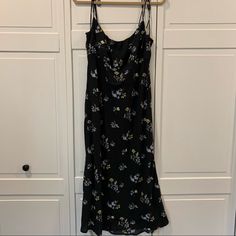 Abercrombie & Fitch, Black And Floral Midi Dress With Spaghetti Strap Ties. Perfect For Spring/Summer! Brand New, Never Worn. Casual Floral Print Slip Dress For Date Night, Floral Print Midi Slip Dress For Day Out, Fitted Black Slip Dress For Spring, Black Slip Dress For Summer Daywear, Spring Floral Print Slip Dress For Night Out, Black Slip Dress For Summer Date Night, Casual Black Slip Dress For Spring, Black Sundress Slip Dress For Spring, Black Fitted Sundress