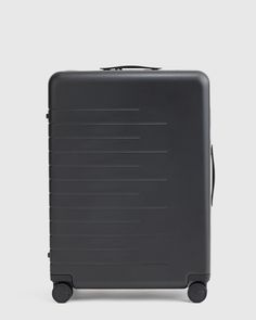 a black suitcase with wheels and handles