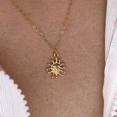 Embrace the suns warmth wherever you go ☼ Dainty sun charm necklace. ✧ 14k gold filled chain  Measurements:  ✧ Length of Chain: approx. 16 inches Follow us on Instagram for updates, sales and new upcoming products! Direct Link to our Instagram Page: https://www.instagram.com/daintyjewelrybyedyn/ Instagram Username: @daintyjewelrybyedyn Sun Choker Necklace, Dainty Sun Design Jewelry For Everyday Wear, Dainty Sun Design Jewelry For Everyday, Dainty Everyday Sun Design Jewelry, Personalized Gold Jewelry For Summer, Dainty Sun And Moon Design Charm Necklaces For Everyday, Dainty Gold Charm Necklace With Sun Design, Gold Dainty Sun Design Charm Necklace, Everyday Dainty Sun And Moon Charm Necklaces