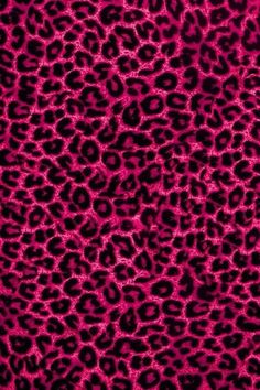 a pink and black animal print background with lots of small spots on it's surface