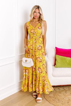 - Stay stylish in this boho beauty! - Unlined lightweight material with a colorful abstract floral print - A v-cut neckline - A strapless cut - An open v-cut back with a tie detail - A stretchy elastic waistline - A flowy yet flattering silhouette that ends in a straight ankle length hemline Measurements S : Bust 34", Hip 46", Length 53", Waist 24-34". M : Bust 36", Hip 48", Length 53.5", Waist 26-36". L : Bust 38", Hip 50", Length 54", Waist 28-38". Yellow Boho Print Maxi Dress For Spring, Floral Print Rayon Sundress With V-neck, Floral Print Rayon V-neck Sundress, Bohemian Yellow Printed Sundress, Bohemian V-neck Sundress With Smocked Back, V-neck Floral Print Rayon Sundress, Yellow Flowy Bohemian Sundress, Flowy Yellow Bohemian Sundress, Yellow Sundress With Smocked Back For Vacation