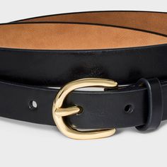 Accessorize your waist in style with this Skinny Belt from A New Day™. This solid black belt with a skinny profile features a gold metal buckle closure for sleek style and shine. The adjustable strap with multiple holes give a secure fit to all your outfits, and you can pair it with casual or dressy ensembles for versatile styling. A New Day™: Style that goes wherever you do. Gold Fitted Belt, Black Belt For Workwear, Fitted Black Belt For Workwear, Sleek Black Belt For Workwear, Sleek Black Belts For Work, Trendy Black Belt For Everyday Wear, Trendy Fitted Belts For Work, Trendy Belt With Gold Buckle For Work, Palaye Royale