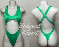 Welcome to my shop Let's Make Money Together 💕 DETAILS  * Handmade Item  * Materials: Nylon, Spandex * Front Cut-out Bodysuit  * Never used  DESCRIPTION  * Thong Bodysuit  * Green Shiny Spandex * 4 way stretch Fabric  * Mannequin is wearing  XS/Small (may choose sizing at checkout) SHIPPING  My current shipping turnaround is really quick 1 to 2 days  RETURNS & EXCHANGES  No refunds or exchanges if you have any issues with your purchase please feel free to reach me personally. I can accommodate Fabric Mannequin, Club Attire, Cutout Bodysuit, 4 Way Stretch Fabric, Rave Outfits, Womens Bodysuit, Dance Wear, Make Money, Stretch Fabric