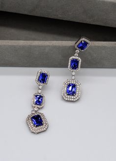 Square Cubic Zirconia drop bridal earring, bridesmaid earring. They are brass with silver, gold or rose gold color plating, lead and nickel free, pierced post backs. it is measured 2 inches long and 0.5 inches at the widest. Marabella Bridal offer square CZ in color Clear, Ruby, Sapphire, Emerald, all small rounded CZ remain clear for you to best match your dress. Our Jewelry is made with premium quality metal and plating, it is light weight and Eco friendly. Bridesmaid Earring, Bridal Earring, Indian Jewelry Earrings, Bridal Earrings Drop, Sapphire Rings, Peridot Necklace, Ruby Sapphire, Butterfly Jewelry, Sapphire Earrings