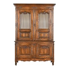 an old wooden cabinet with glass doors