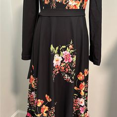 Anna Hariri Modest Floral Dress Black Size 10 Nwot. Waist Pleated Dress Of An Eye-Catching Floral Pattern And Color. Zips At The Back. Ablution Friendly Sleeves. Polyester Mix Fabric. Lined. Normal Machine Wash At 30 Degrees, Iron Inside Out. Armpit To Armpit 19” Waist 36” Length 58” Shoulder To Shoulder 16" Sleeve 25” Fabric Content 100% Washable Polyester From A Smoke And Pet Free Very Clean Home Black A-line Maxi Dress For Brunch, Black A-line Maxi Dress With Floral Print, Formal Black Midi Dress With Floral Print, Black Floral Print Dress For Work, Modest Floral Dress, Eid Dress, Eid Dresses, Clean Home, Mixing Fabrics