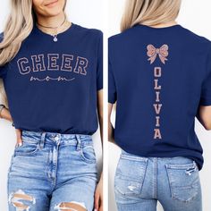 Customize this cheer shirt to meet your needs! Add a name and choose from a variety of shirt colors to make the perfect cheer shirt! Other shirt color options and styles are available. If you don't see what you're looking for send us a message! Make sure to see the size and fit charts (last images) to confirm the best fit for you. We recommend measuring a similar shirt in your closet (that fits you well) and comparing it to the measurements in the chart.  Please note that we do our best to captu Casual Glitter Print Tops For Cheerleading, Short Sleeve Glitter Print Top For Cheerleading, Short Sleeve Top With Glitter Print For Cheerleading, School Spirit Glitter Print Short Sleeve Top, School Spirit Short Sleeve Top With Glitter Print, Short Sleeve Tops With Glitter Print For School Spirit, Short Sleeve Tops With Glitter Print For Game Day, Cheerleading T-shirt With Glitter Print Crew Neck, Cheerleading Glitter Print Crew Neck T-shirt