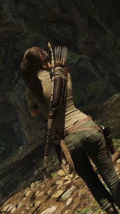 an image of a woman with arrows in her hair standing on rocks and looking into the distance