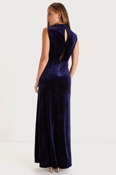 Feel like the Queen that you are in the Lulus Classic Elegance Navy Velvet Sleeveless Mock Neck Maxi Dress! Stretchy plush velvet shapes this gorgeous dress that has a mock neckline and a sleeveless bodice with gathered fabric detailing. An elasticized waist tops a stunning maxi skirt complete with twin side slits. Cute keyhole cutout secures with a double button closure at back. Hidden back zipper/clasp. Fit: This garment fits true to size. Length: Floor length. Size medium measures 60.5" from Fitted Sleeveless Velvet Dress, Elegant Sleeveless Velvet Dress For Formal Occasions, Sleeveless Velvet Dress For Night Out, Sleeveless Evening Velvet Dress, Chic Fitted Sleeveless Velvet Dress, Mock Neck Maxi Dress, Fabric Detailing, Gathered Fabric, Vegas Dresses