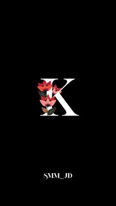 the letter k is made up of flowers and letters that spell it's capital