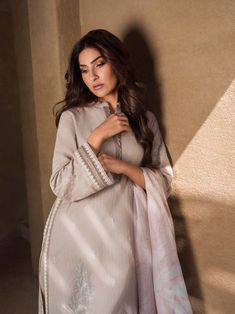 Brand: SaharProduct Code: S24-TL-L1-05Collection: Mirage by Sahar Unstitched Spring Summer CollectionFabric: Lawn DESIGN DETAILS: Embroidered Front Panel on Fancy Slub Lawn Fancy Slub Lawn Back Panel Embroidered Sleeves Digital Printed Silk Dupatta 2.5M Dyed Cambric Trouser 2 M DISCLAIMER:* Lining, Laces, and Tassels are not included in unstitched variants.* Embellishment items in stitched outfits are subject to market availability.* Product color may vary due to photographic lighting or your device settings. CARE INSTRUCTIONS: Extra Fabric Has Been Used For Shoot Original Color May Vary Slightly From The Picture Dry Clean Recommended Iron The Clothes At Moderate Temperature Do Not Use Bleach, Or Stain Removing Chemicals Damp Fabric Should Not Be Exposed To Sunlight Mirage by Sahar Unstitc Luxury Beige Summer Suit, Luxury Unstitched Lawn Suit, Luxury Slub Silk Sets For Spring, Luxury Elegant Tussar Silk Lawn Suit, Luxury Beige Lawn Suit With Dupatta, Luxury Embroidered Slub Silk Dress, Luxury Designer Silk Lawn Suit, Luxury Unstitched Cambric Sets, Luxury Designer Lawn Suit With Self Design