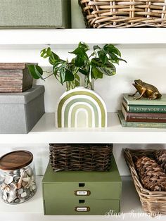 the shelves are filled with books, baskets and other decorative items on top of them