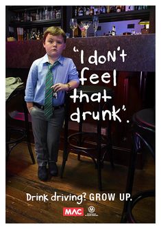 a young boy wearing a tie standing in front of a bar with the caption i don't feel that drunk, drink driving grow up