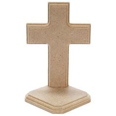 a stone cross is shown against a white background