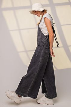 Unleash your inner fashionista in our Easel Mineral Washed Cotton Gauze Wide Leg Jumpsuit. Made with lightweight and breathable cotton gauze, this jumpsuit is perfect for any occasion. Its wide legs provide a flowy and flattering look, making you feel confident and stylish. Elevate your wardrobe with this must-have piece! Details:- Front Pockets- Slouchy, Wide Legs- Square Neckline- Adjustable Strap- Back Tie Detail- Textured Fabrication Fabric:- 100% Cotton Spring Cotton Denim Jumpsuit With Adjustable Straps, Trendy Cotton Jumpsuits And Rompers With Adjustable Straps, Spring Cotton Jumpsuits And Rompers With Suspenders, Black Bib Front Jumpsuit For Spring, Spring Cotton Overalls With Adjustable Straps, Cotton Jumpsuits And Rompers With Adjustable Straps, Cotton Jumpsuit With Adjustable Straps And Bib Front, Cotton Overall Jumpsuit With Suspenders, Cotton Overall Jumpsuits And Rompers With Suspenders