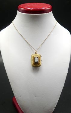 "Vintage gold filled chain and Victorian rectangle photo locket cameo pendant necklace, In good antique vintage condition. The chain 19\" long, Pendant 1\" x 5/8' and ½\" thick. Pendant dates 1890's. Weighs 6.9 gram. Marked 1/20 14k GF on the clasp. Thanks." Gold Rectangular Necklace For Keepsakes, Gold Rectangular Keepsake Necklace, Victorian Gold Rectangular Necklace, Victorian Rectangular Gold Necklace, Rectangular Vintage Charm Jewelry For Formal Occasions, Antique Square Locket Pendant Jewelry, Antique Square Pendant Locket Jewelry, Vintage Yellow Gold Necklace With Rectangular Pendant, Vintage Yellow Gold Necklace With Square Pendant