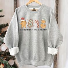 Christmas Gingerbread Cookie Sweatshirt, Gingerbread Lover Gift, Xmas Shirt, Christmas Matching Sweatshirt, Christmas Holiday Gift Suitable for many occasions such as Christmas, Father's Day, Mother's Day, birthday This classic crew-neck sweatshirt is an essential basic item for anyone’s wardrobe. The ribbed cuffs on the sleeves and waist are reinforced, and the high-quality cotton ensure that anyone will enjoy this cuddly and cool sweatshirt for many moons to come. Preshrunk fleece knit Double- Family Sweater, Griswold Family, Christmas Gingerbread Cookies, You Serious Clark, Coffee Sweater, Grey Christmas, Xmas Tees, Christmas Matching, Funny Christmas Sweaters