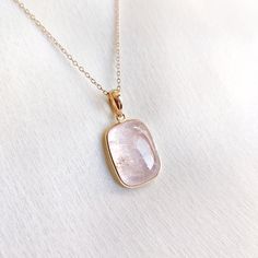 This stunning Pendant is set in 14k Solid Yellow Gold with Natural Morganite with utmost precision. It is a unique gemstone Pendant for nearly every occasion and is completely hassle-free jewelry. ITEM DETAILS: * Gem: Morganite * Gem Size: 15X15mm * Gem Shape: Square * Gem Weight: 9.20 carats * Gold Purity: 14KT * Gold Weight: 0.60 gram * Total Weight of the Pendant: 2.44 gram The Gold purity is guaranteed and it comes with authentic 14KT gold hallmark. Since my items are handmade, they are absolutely nickel and lead free. CUSTOMIZATION: * Gemstone customization is available and it can be substituted with a gem of your choice. Kindly message me for the same. PACKAGING * The Pendant comes with layers of safe and secure wrapping along with Free handmade jewelry box with every purchase. ➡️Hea 14k Gold Jewelry With Gemstone Accents For May Birthstone, 14k Gold Jewelry With May Birthstone Gemstone Accents, Delicate Gemstone Jewelry For Anniversary, Fine Jewelry With Rectangular Gemstone Accents, Fine Jewelry With Gemstone Accents Rectangular Shape, Morganite Fine Jewelry In Yellow Gold, Formal Yellow Gold Morganite Jewelry, Fine Jewelry With Rectangular Birthstone, Faceted 14k Gold Jewelry For Anniversary