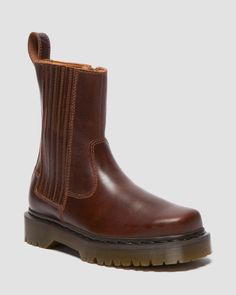 Amaayah Lo Leather Boots in Butterscotch | Dr. Martens Square Toe Chelsea Boots, Chelsea Boots Heel, Black Dr Martens, Patent Boots, Fame Dr, Brown Leather Boots, Doc Martens, Pull Up, Boots For Sale