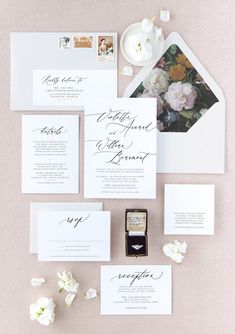 the wedding stationery is laid out and ready to be used