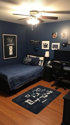 a bed room with a neatly made bed next to a computer desk and a ceiling fan