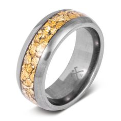 a wedding ring with gold and silver inlays on the outside, set against a white background