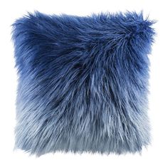 a blue furry pillow on a white background