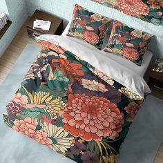 an image of a bedroom setting with flowers on the comforter and bedding set